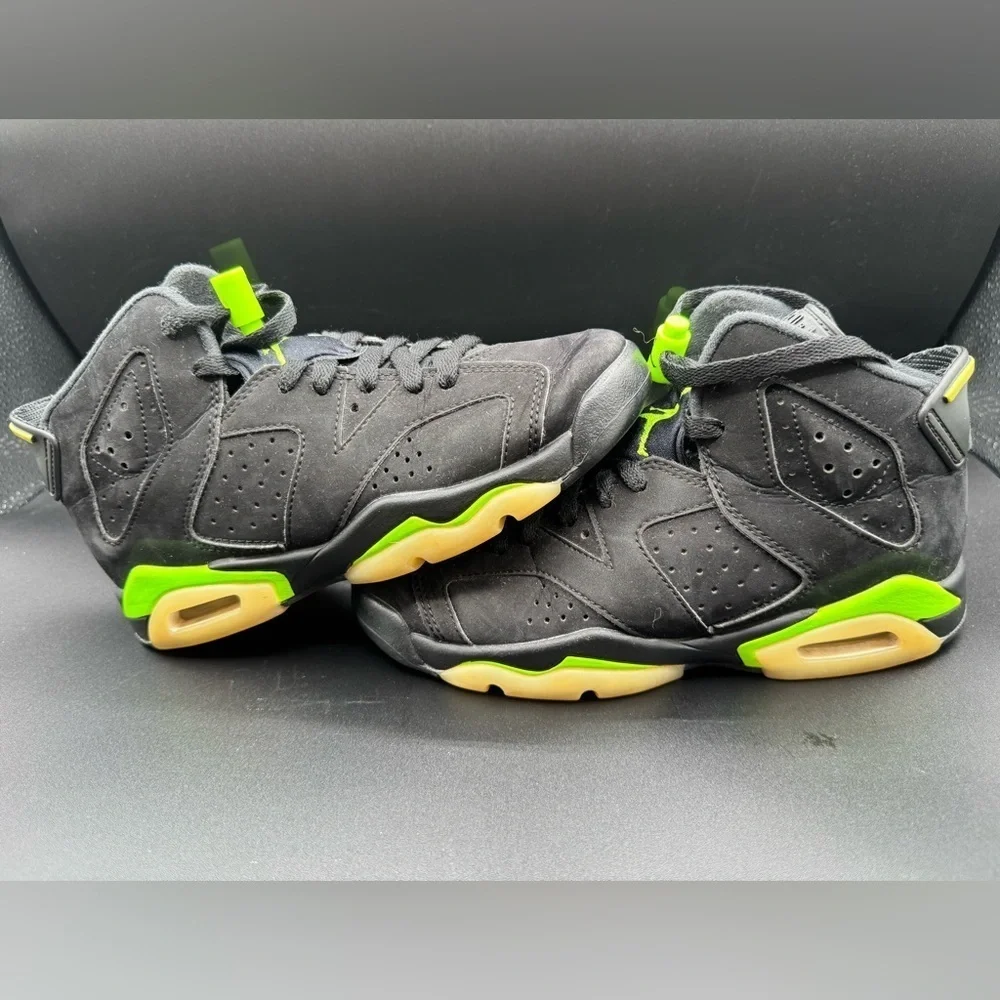 Jordan Black and Green Sneakers with Air Unit and Perforated Panels